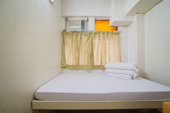 Imagen de la habitación del Hostal Kam Fu Guest House. Foto 8