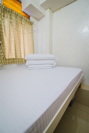 Imagen de la habitación del Hostal Kam Fu Guest House. Foto 9