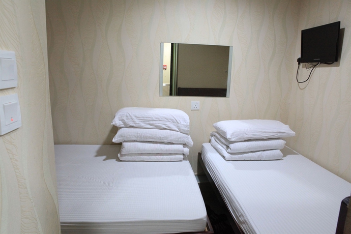 Imagen de la habitación del Hostal Kam Fu Guest House. Foto 11