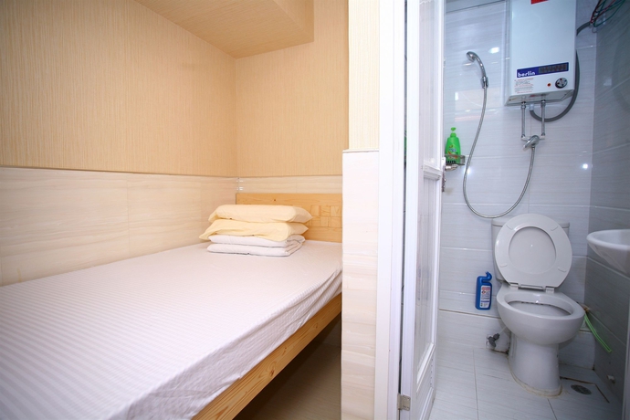 Imagen de la habitación del Hostal Kam Fu Guest House. Foto 13