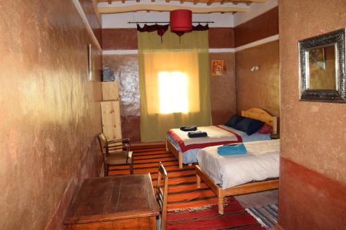 Imagen de la habitación del Hostal Kasbah Alta&iuml;r. Foto 15