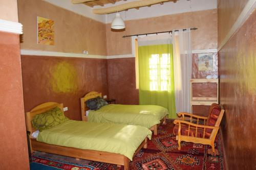 Imagen de la habitación del Hostal Kasbah Alta&iuml;r. Foto 17