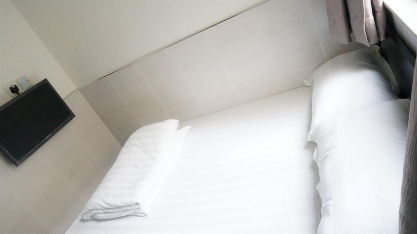 Imagen de la habitación del Hostal Kowloon Mongkok 1812 Guest House. Foto 6