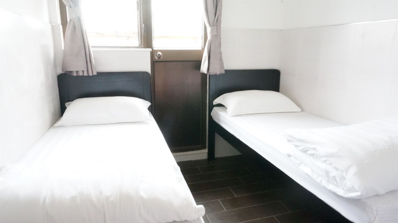 Imagen de la habitación del Hostal Kowloon Mongkok 1812 Guest House. Foto 12