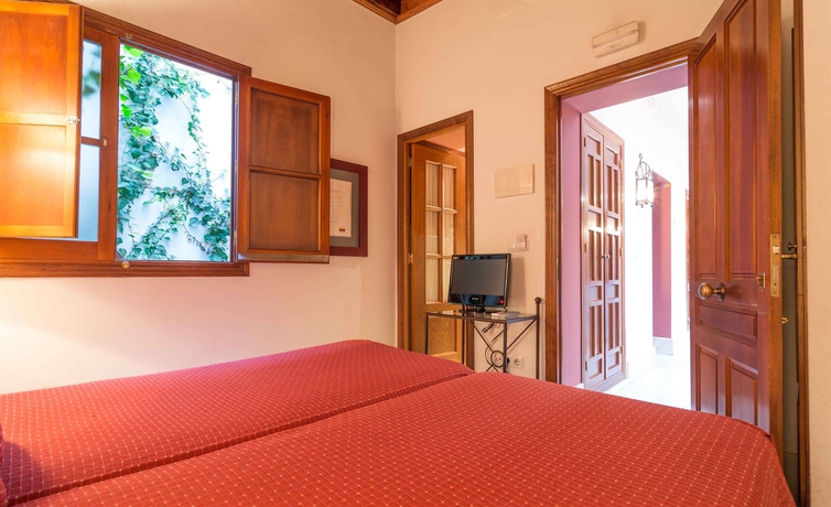 Imagen de la habitación del Hostal La Abadia de Giralda. Foto 4
