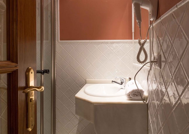 Imagen de la habitación del Hostal La Abadia de Giralda. Foto 8