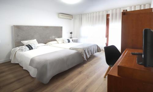 Imagen de la habitación del Hostal La Carrasca. Foto 14