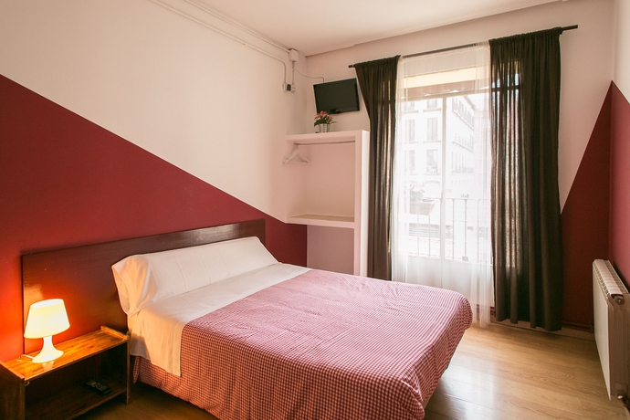 Imagen de la habitación del Hostal La Casa De La Plaza. Foto 4