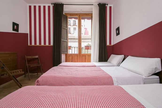 Imagen de la habitación del Hostal La Casa De La Plaza. Foto 5