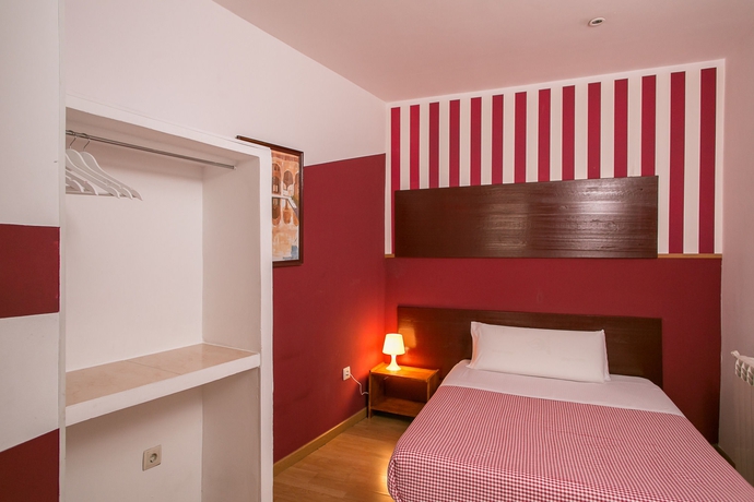 Imagen de la habitación del Hostal La Casa De La Plaza. Foto 9