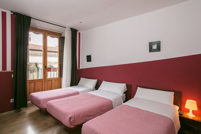 Imagen de la habitación del Hostal La Casa De La Plaza. Foto 13