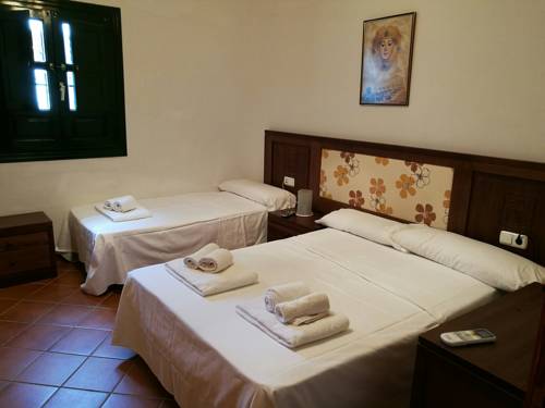 Imagen de la habitación del Hostal La Fonda del Rocío. Foto 15