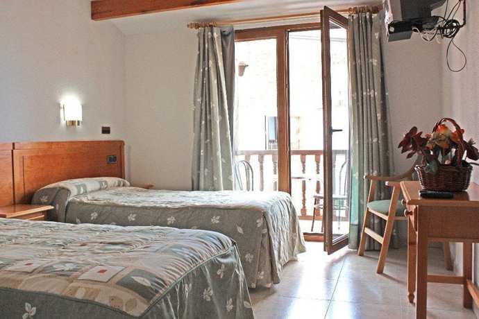 Imagen de la habitación del Hostal La Maya. Foto 13