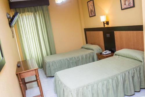 Imagen de la habitación del Hostal La Palmera, Miajadas. Foto 7