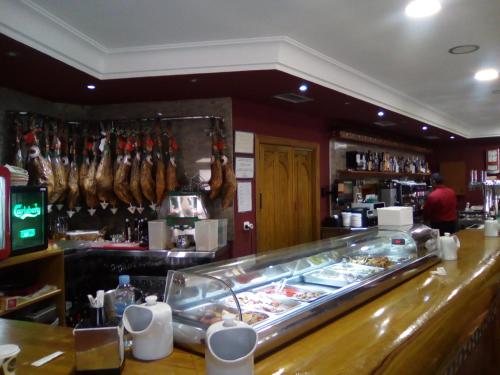 Imagen de la habitación del Hostal La Parada, Pedro Martínez. Foto 8