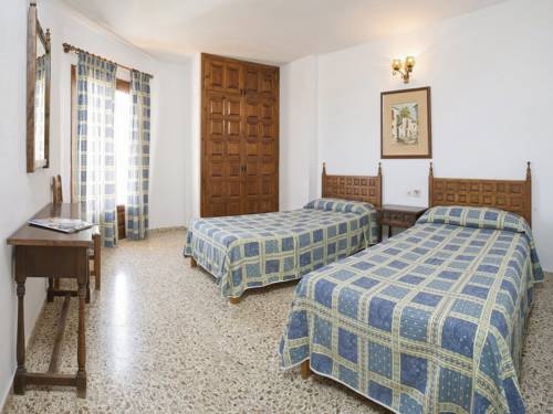 Imagen de la habitación del Hostal La Perla, Playa es Caná. Foto 17