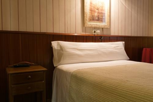 Imagen de la habitación del Hostal La Vera. Foto 15