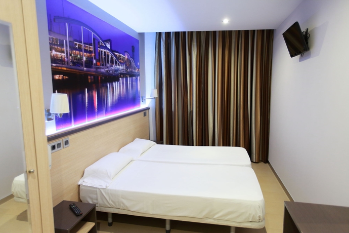 Imagen de la habitación del Hostal Las Flores. Foto 12