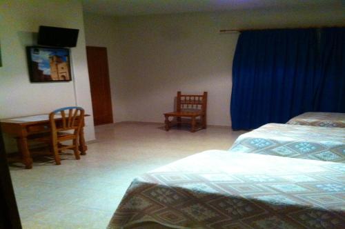 Imagen de la habitación del Hostal León, Trujillo. Foto 8