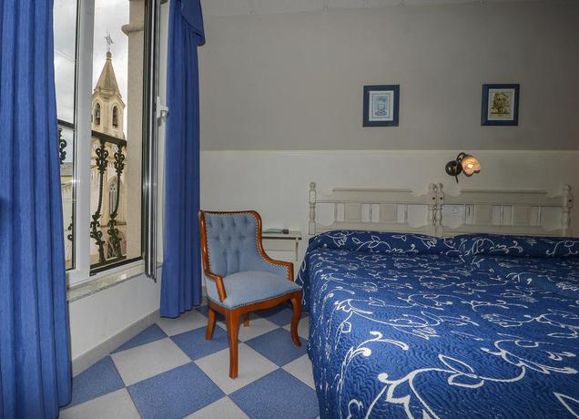 Imagen de la habitación del Hostal Linares, Ribadeo. Foto 10