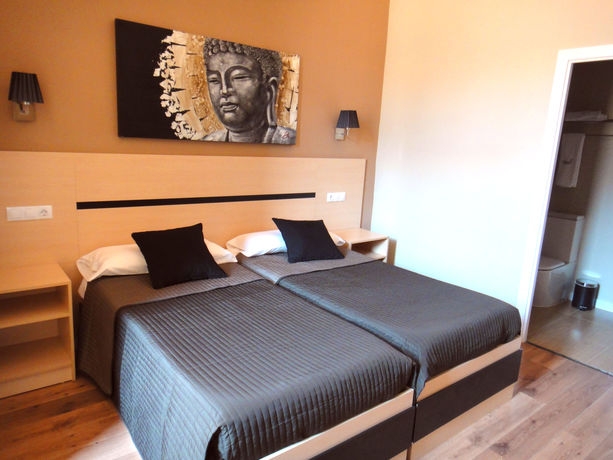 Imagen de la habitación del Hostal Live Natura Barcelona. Foto 10