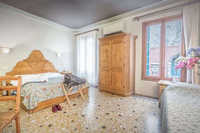 Imagen de la habitación del Hostal Locanda ai Bareteri. Foto 6