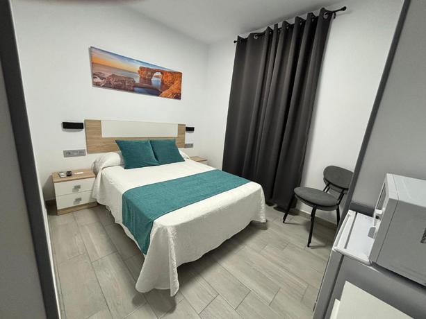 Imagen de la habitación del Hostal Los Mellizos, Conil de la Frontera. Foto 19