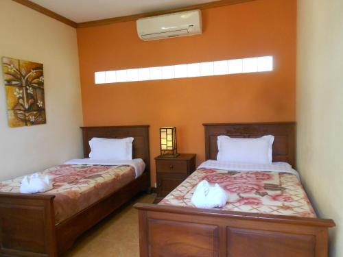Imagen de la habitación del Hostal Luang Prabang Manichan Villa. Foto 5