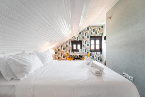 Imagen de la habitación del Hostal Magnolia Inn, Aveiro. Foto 8