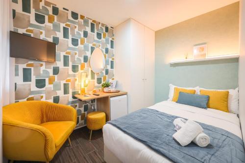 Imagen de la habitación del Hostal Magnolia Inn, Aveiro. Foto 11
