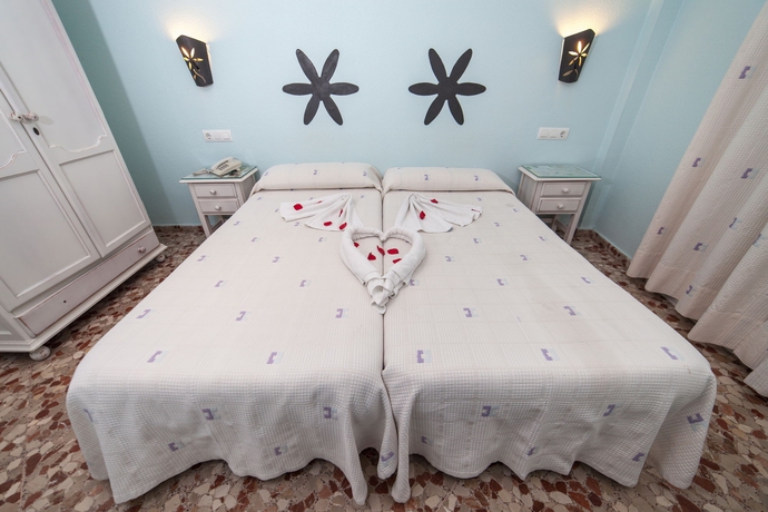 Imagen de la habitación del Hostal Margaritas 21 Rooms. Foto 7