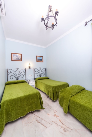 Imagen de la habitación del Hostal Margaritas 21 Rooms. Foto 11