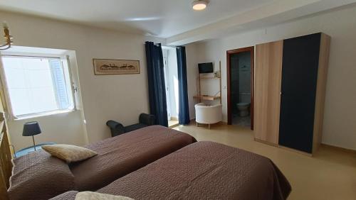 Imagen de la habitación del Hostal Martin, Ba&ntilde;os de Montemayor. Foto 4