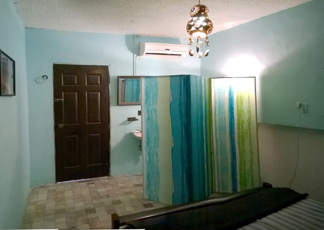 Imagen de la habitación del Hostal Maya Cha'an Guesthouse. Foto 5