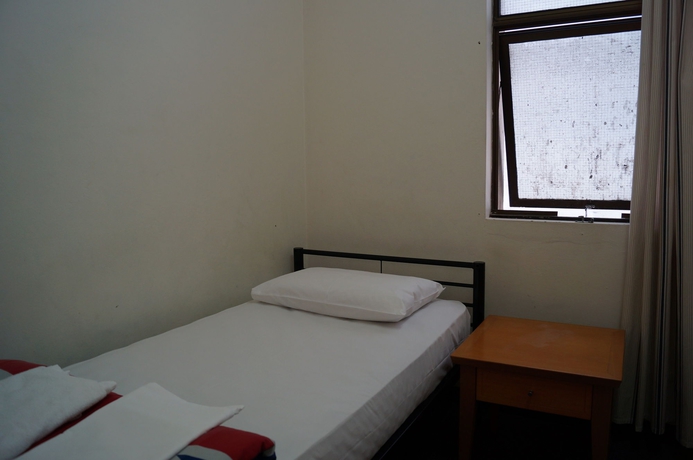 Imagen de la habitación del Hostal Maze Backpackers. Foto 7