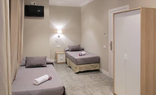 Imagen de la habitación del Hostal Medea, Eixample. Foto 5