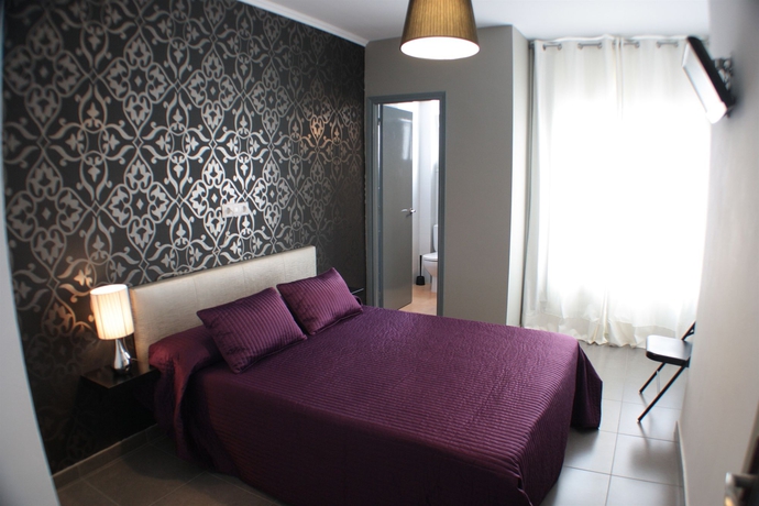 Imagen de la habitación del Hostal Mediterráneo, Tossa de Mar. Foto 5