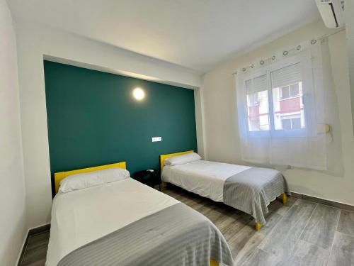 Imagen de la habitación del Hostal New Click & Room. Foto 8