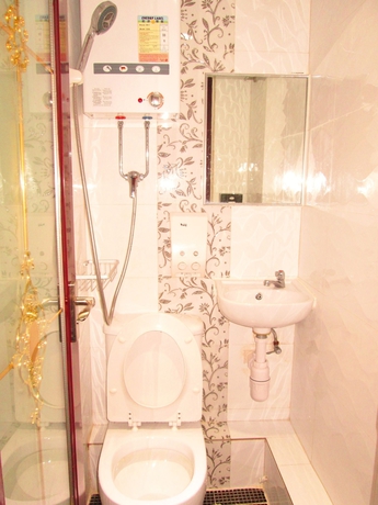 Imagen de la habitación del Hostal New Shanghai Guest House. Foto 5