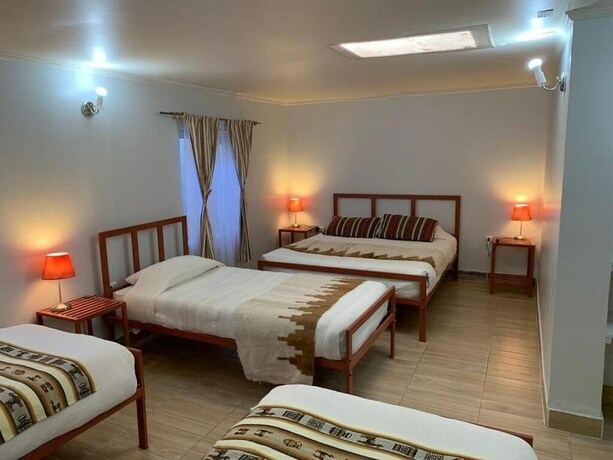 Imagen de la habitación del Hostal Nuevo Amanecer. Foto 2