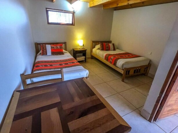 Imagen de la habitación del Hostal Nuevo Amanecer. Foto 5