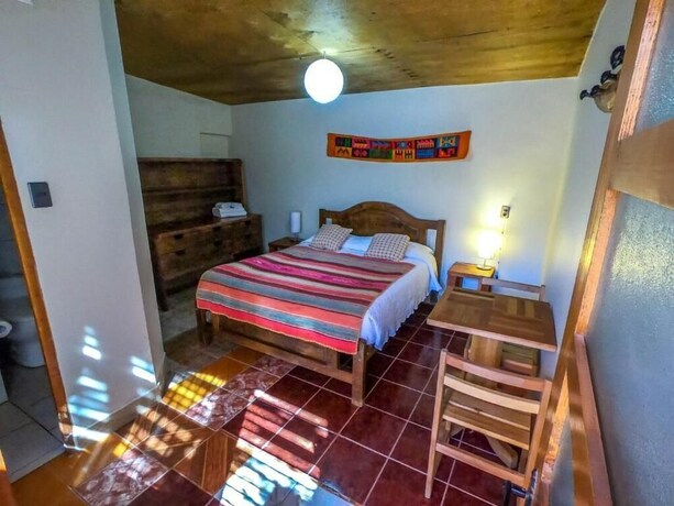 Imagen de la habitación del Hostal Nuevo Amanecer. Foto 7