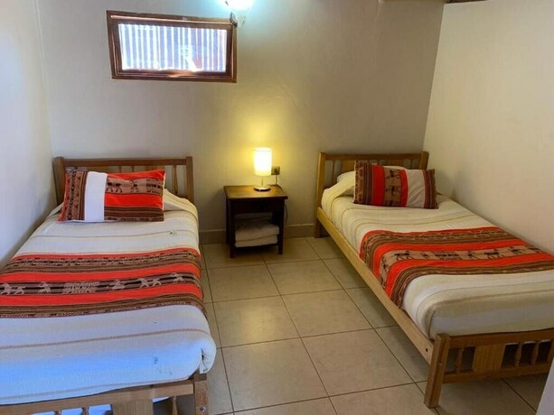 Imagen de la habitación del Hostal Nuevo Amanecer. Foto 9