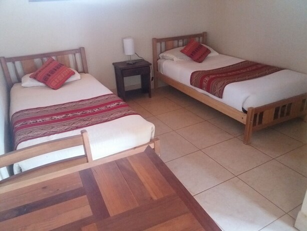 Imagen de la habitación del Hostal Nuevo Amanecer. Foto 11