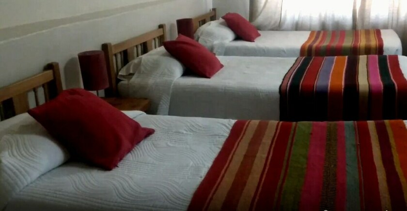 Imagen de la habitación del Hostal Nuevo Amanecer. Foto 13