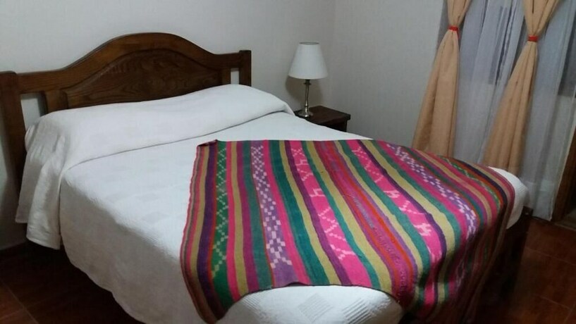 Imagen de la habitación del Hostal Nuevo Amanecer. Foto 16