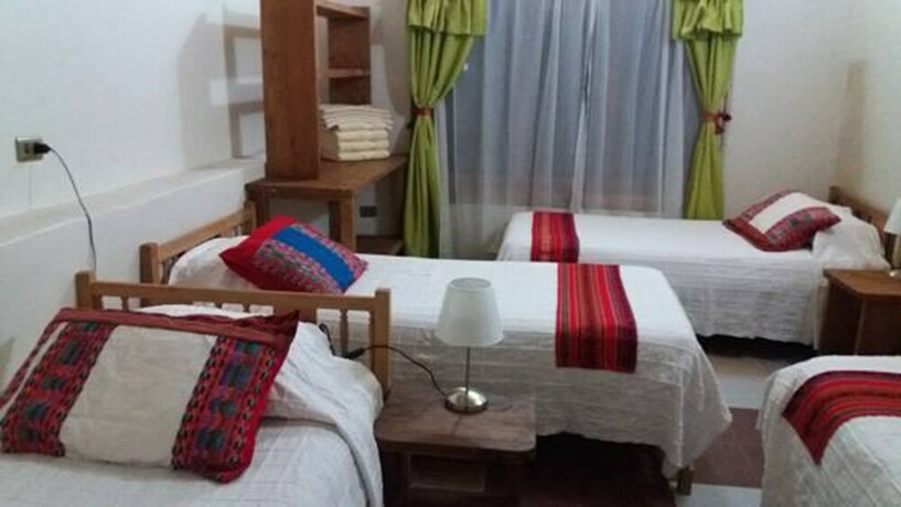 Imagen de la habitación del Hostal Nuevo Amanecer. Foto 18