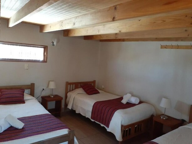 Imagen de la habitación del Hostal Nuevo Amanecer. Foto 19