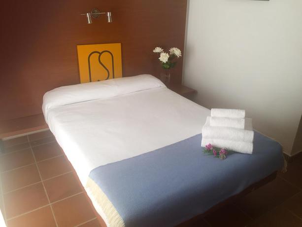 Imagen de la habitación del Hostal OYO El Rocío Azul. Foto 3