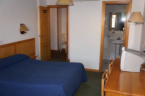 Imagen de la habitación del Hostal OYO Hostal La Posada. Foto 3